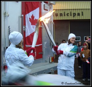 Lighting the next runner's torch